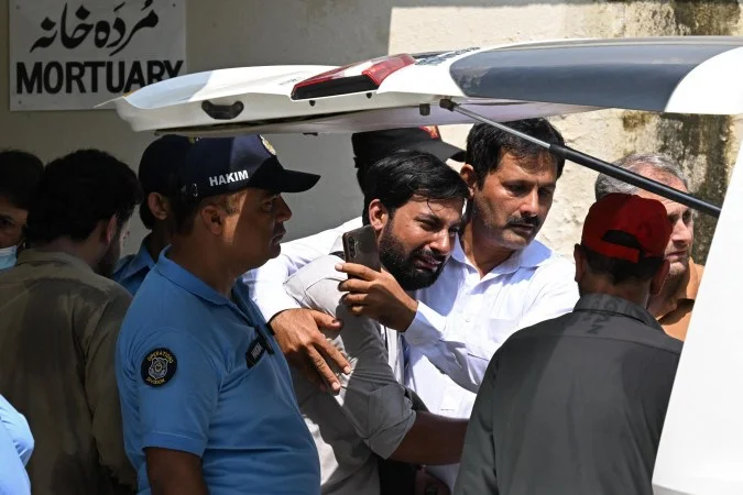 1_afp--20260826--c6hn664--v2--highres--topshotpakistanhospitalfire-67516631